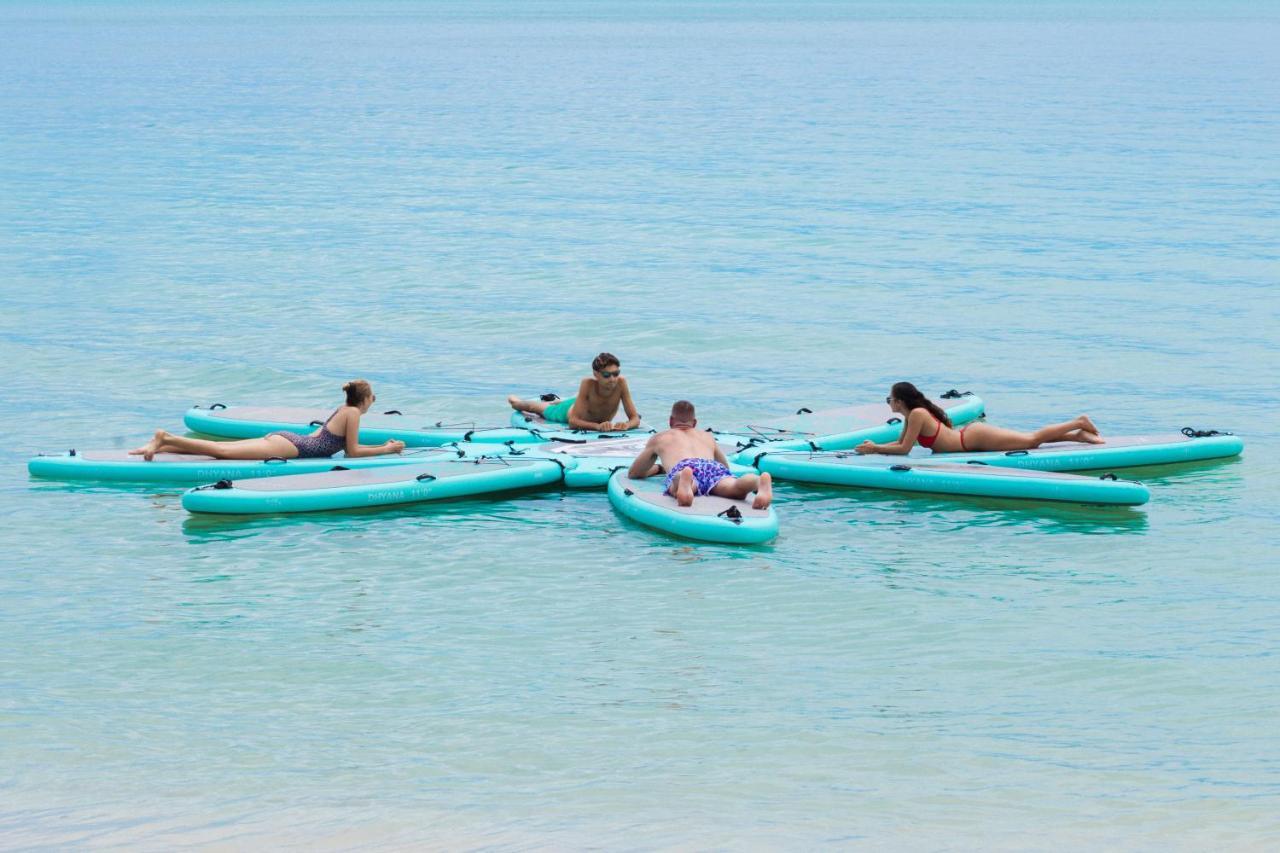 Avani Chaweng Samui Hotel & Beach Club - Adults Only Exterior photo Stand Up Paddle Boarders in the Gulf of Naples
